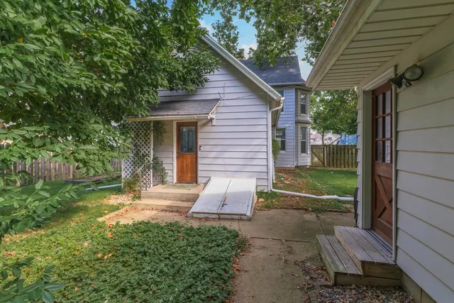 a view of backyard with green space