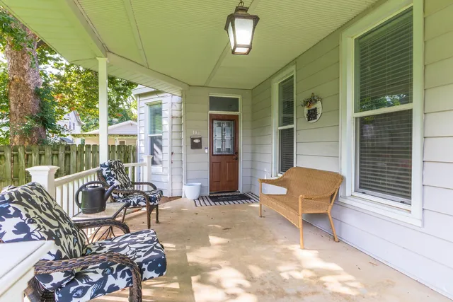a outdoor living space with furniture and a potted plant
