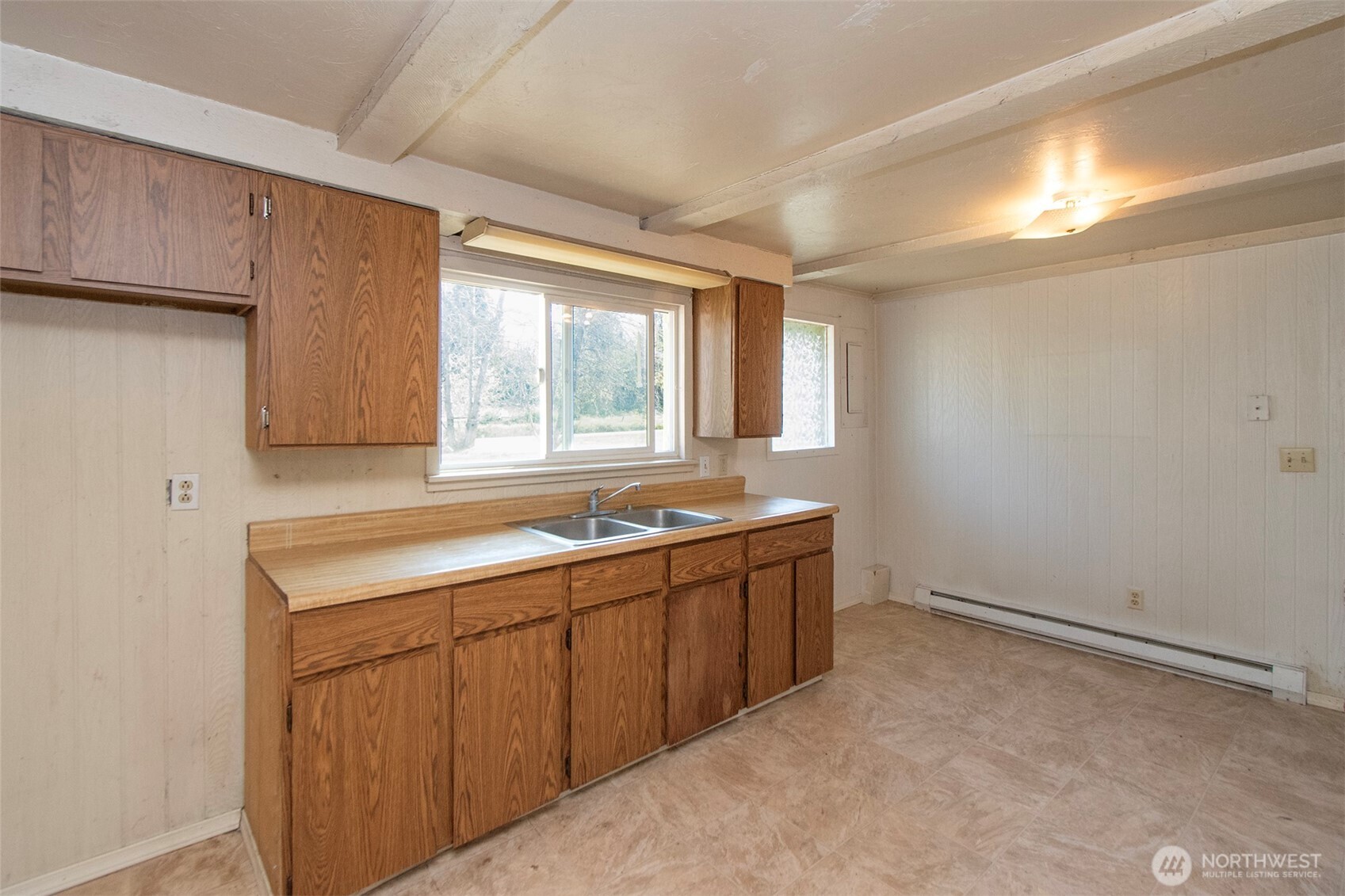 190 Pierson Road Sequim, WA 98382 - Photo 12 of 40 a room with a sink cabinets and a window