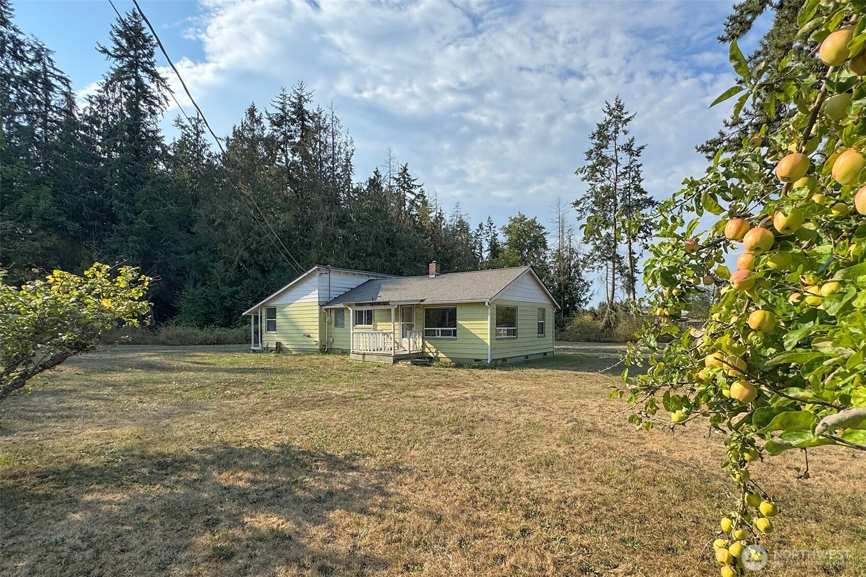 190 Pierson Road Sequim, WA 98382 - Photo 34 of 40 a front view of a house with a garden