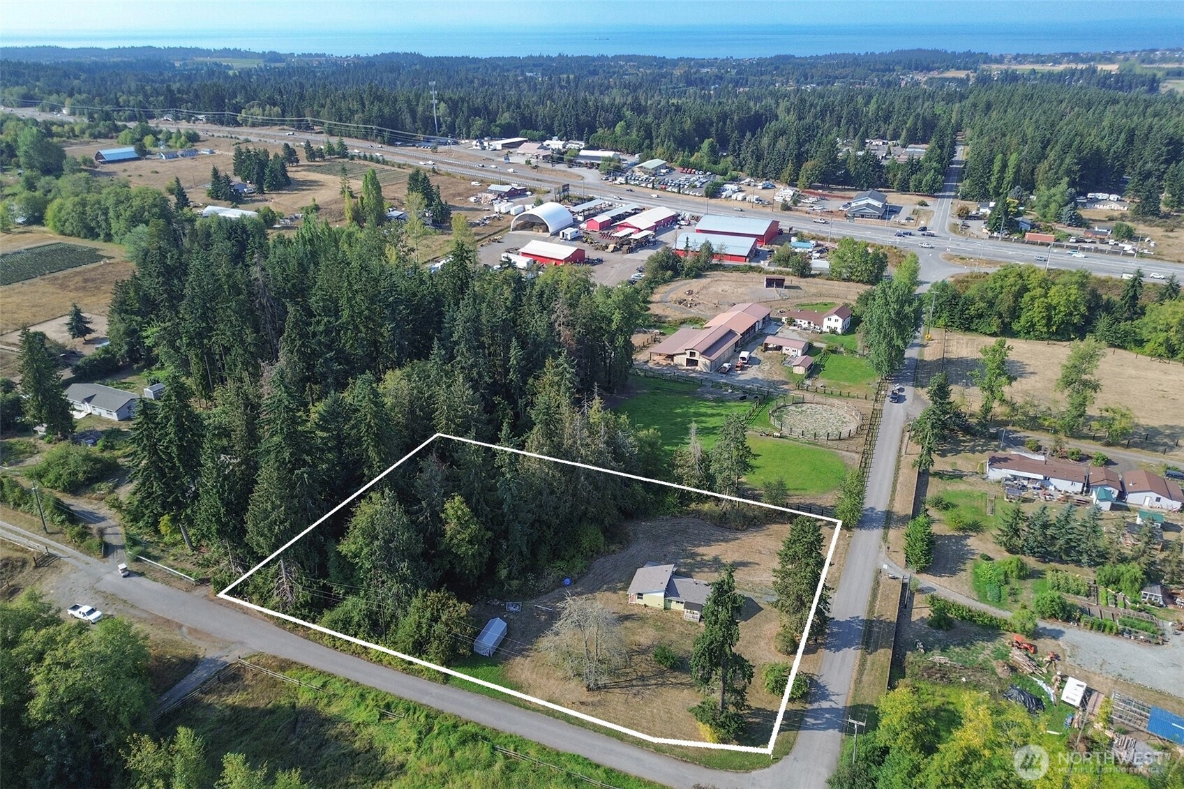 190 Pierson Road Sequim, WA 98382 - Photo 4 of 40 an aerial view of residential house with outdoor space and seating
