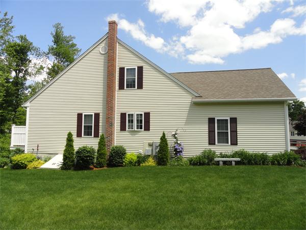 13 Billy Lane, Unit 13 Rutland, MA 01543 - Photo 4 of 25 a front view of house with yard and green space