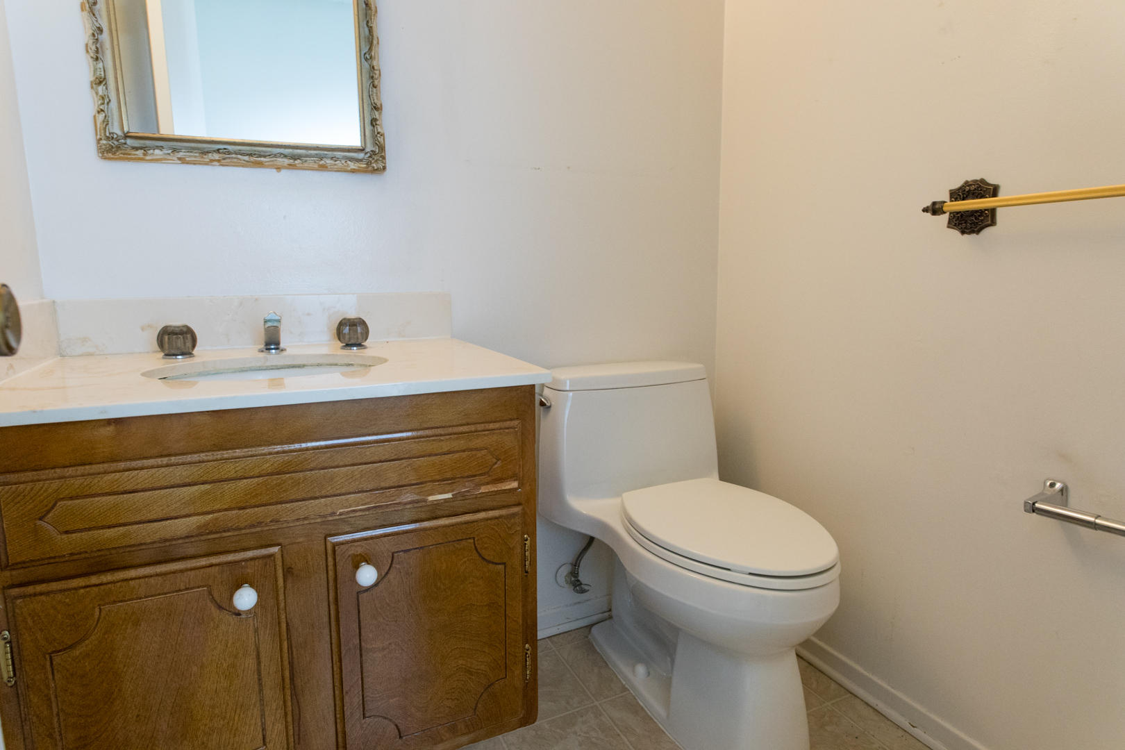 614 Arundel Road Goleta, CA 93117 - Photo 6 of 18 a bathroom with a toilet sink and mirror