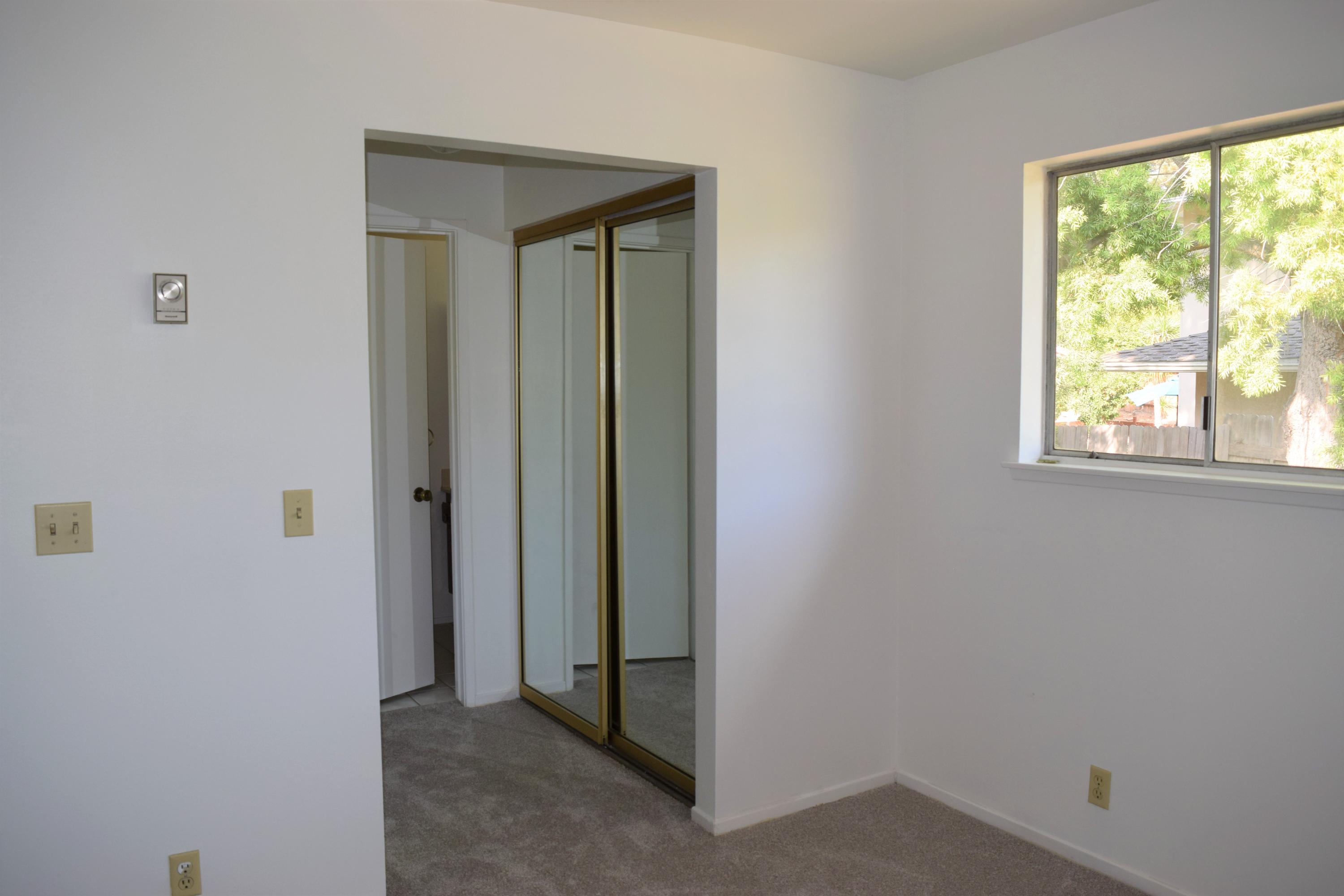 614 Arundel Road Goleta, CA 93117 - Photo 9 of 18 a view of an empty room with a window