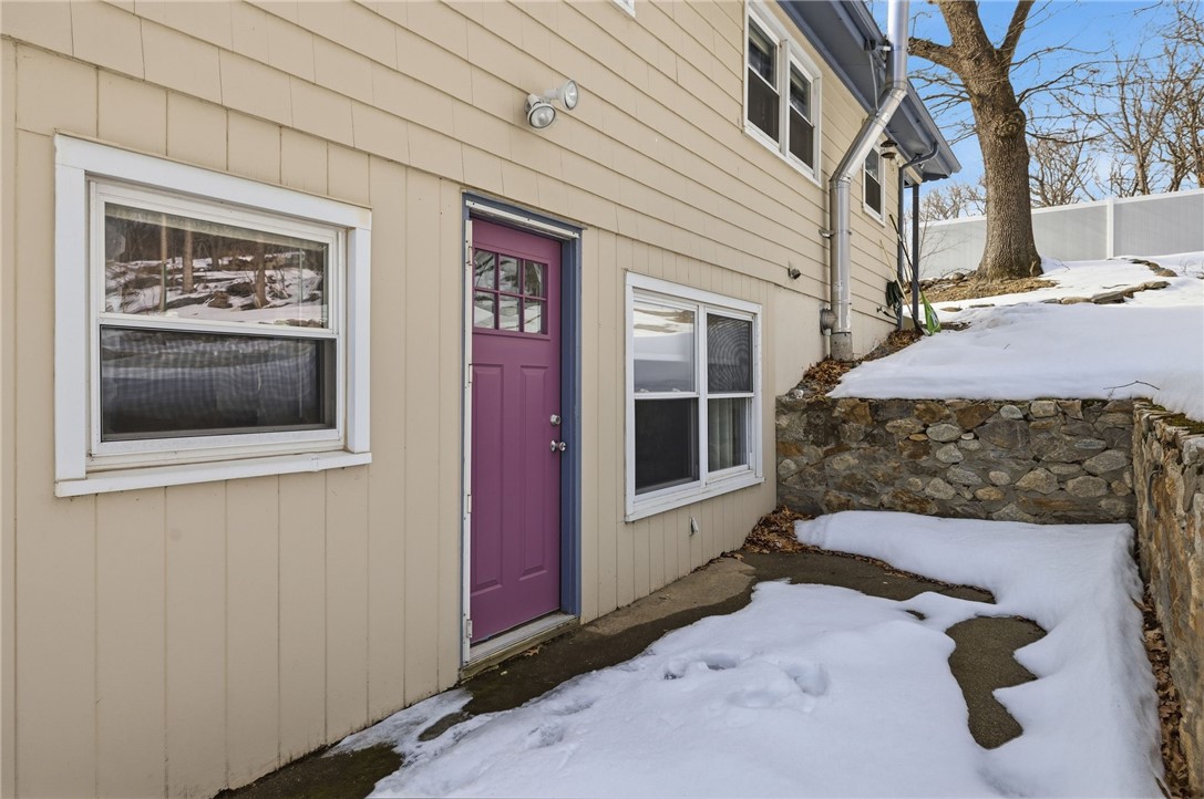 15 Anita Road Johnston, RI 02919 - Photo 24 of 28 A private patio space is located outside of the bonus room.