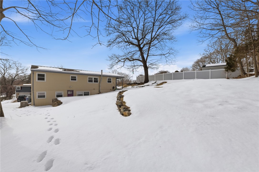 15 Anita Road Johnston, RI 02919 - Photo 27 of 28 Warmer months bring even more privacy when the surrounding trees leaf out.