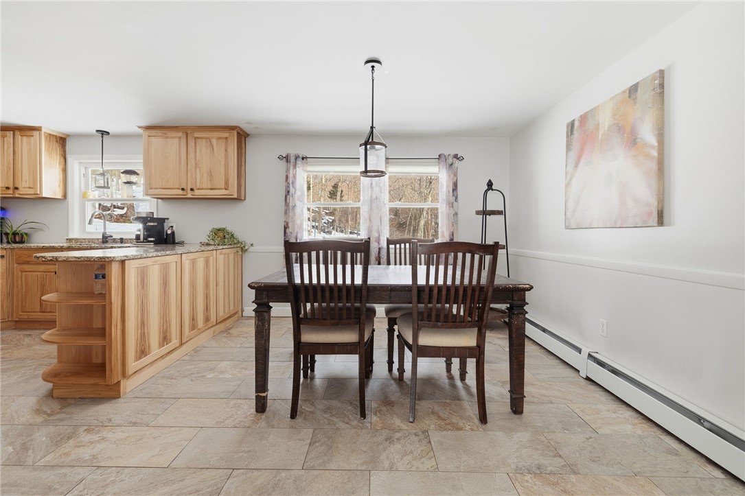 15 Anita Road Johnston, RI 02919 - Photo 10 of 28 A separate dining area is able to accommodate larger dinette sets.