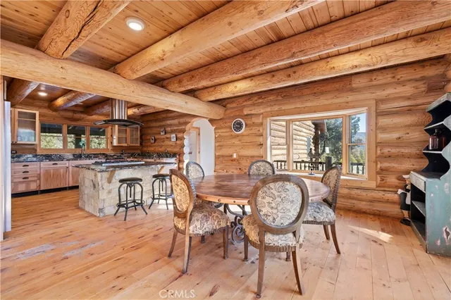 a kitchen with stainless steel appliances granite countertop a stove and a sink