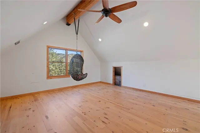 a view of house with a yard