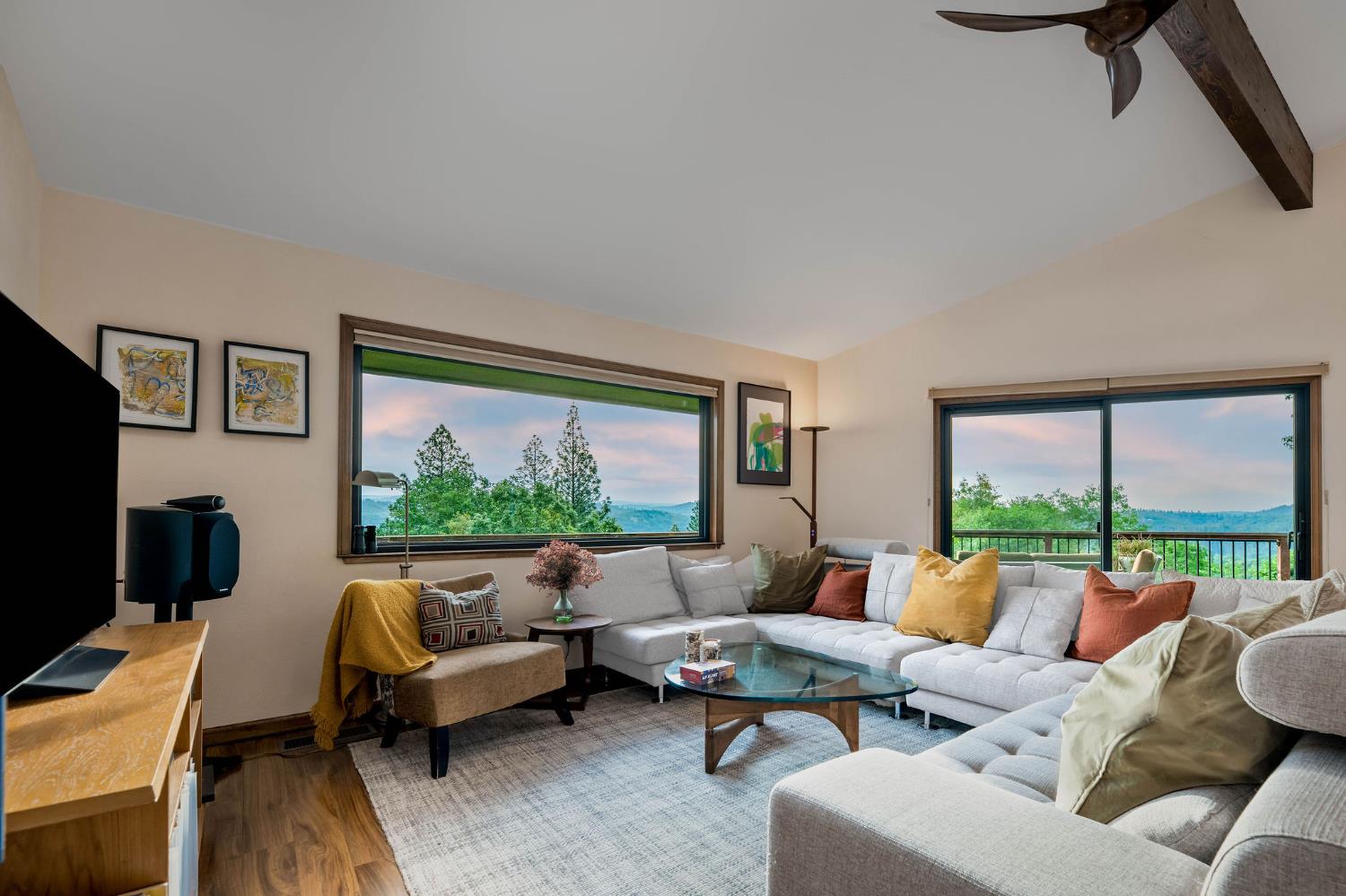 16105 John Way Grass Valley, CA 95949 - Photo 14 of 71 a living room with furniture large window and flat screen tv