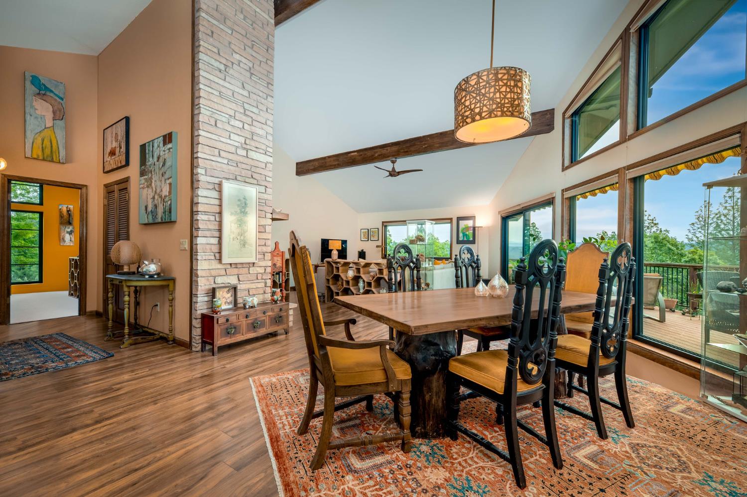 16105 John Way Grass Valley, CA 95949 - Photo 18 of 71 a dining room with furniture a rug and wooden floor