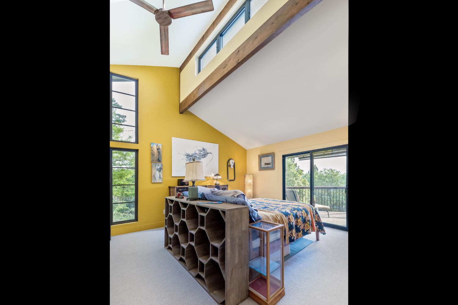 16105 John Way Grass Valley, CA 95949 - Photo 30 of 71 a bedroom with furniture and large windows