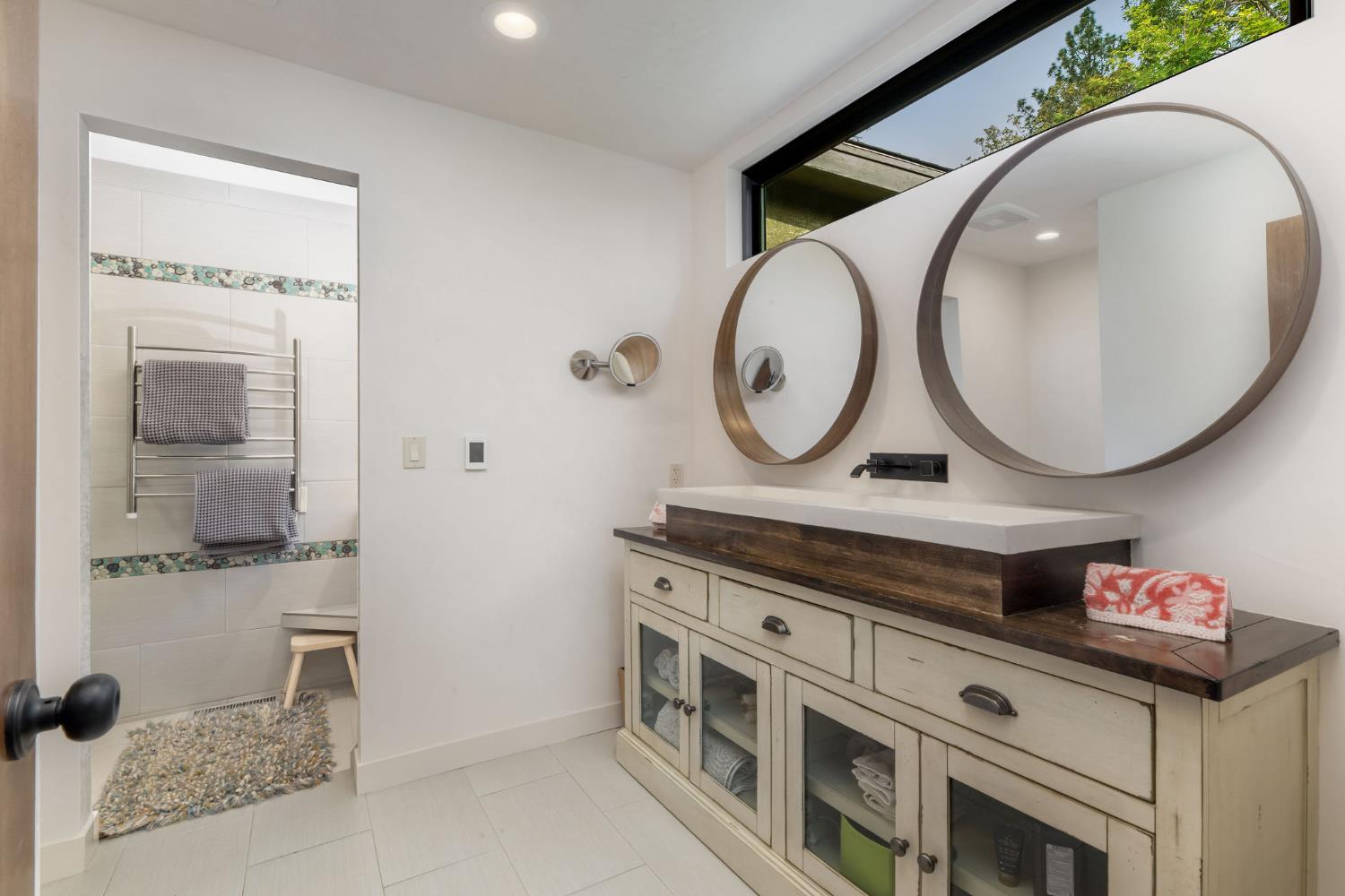 16105 John Way Grass Valley, CA 95949 - Photo 32 of 71 a bathroom with a sink a vanity and a mirror