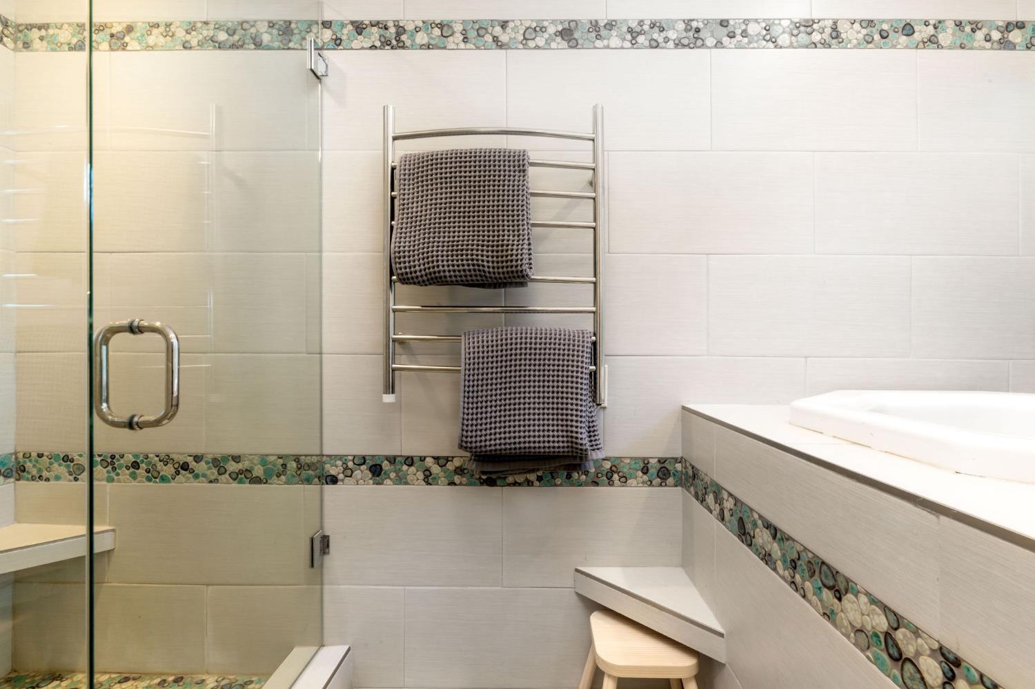 16105 John Way Grass Valley, CA 95949 - Photo 34 of 71 a bathroom with a bathtub and shower