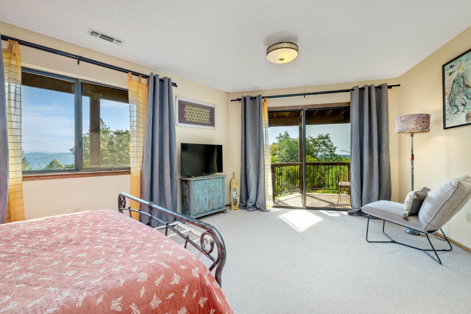 16105 John Way Grass Valley, CA 95949 - Photo 40 of 71 a bedroom with a bed and a large window