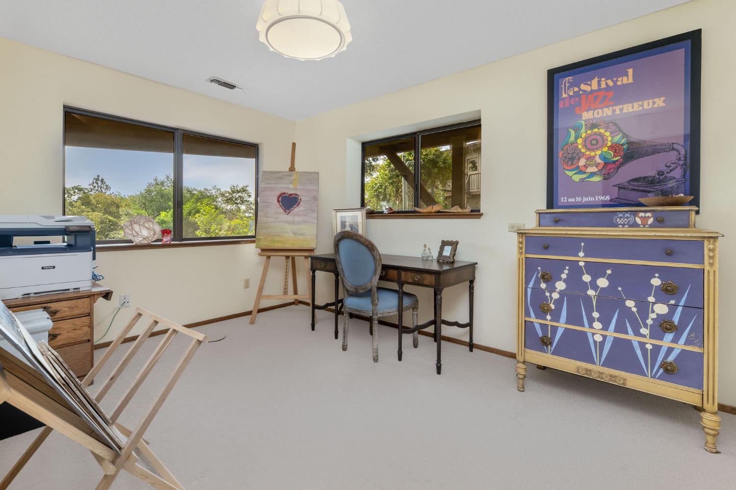 16105 John Way Grass Valley, CA 95949 - Photo 44 of 71 a living room with furniture and a painting on the wall