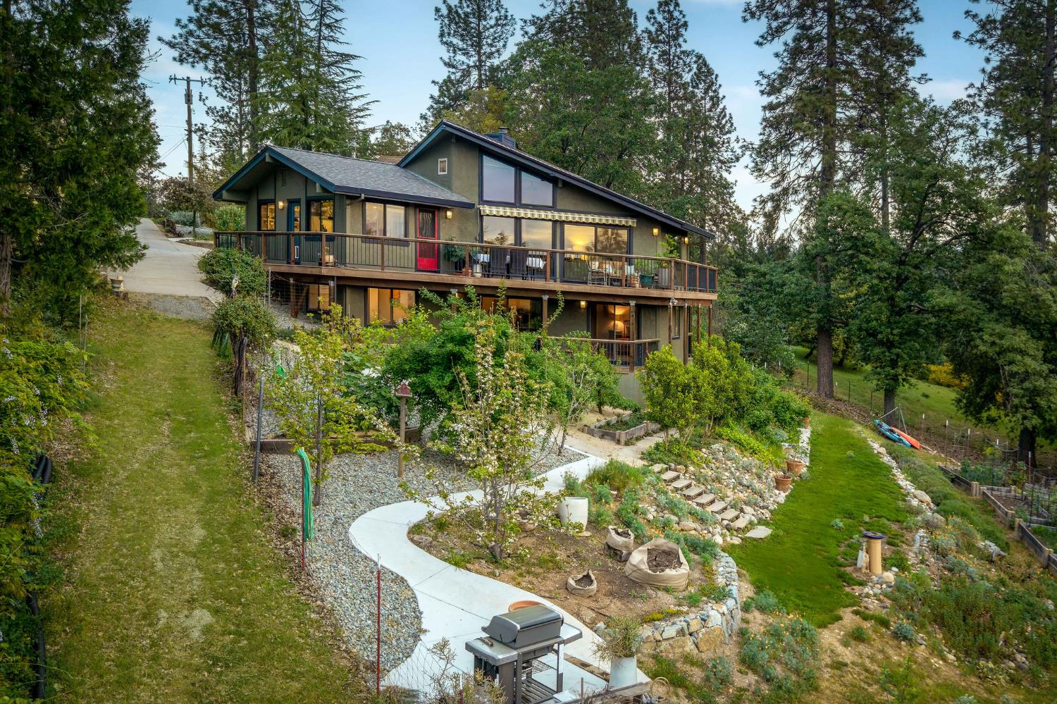 16105 John Way Grass Valley, CA 95949 - Photo 47 of 71 a front view of a house with a yard