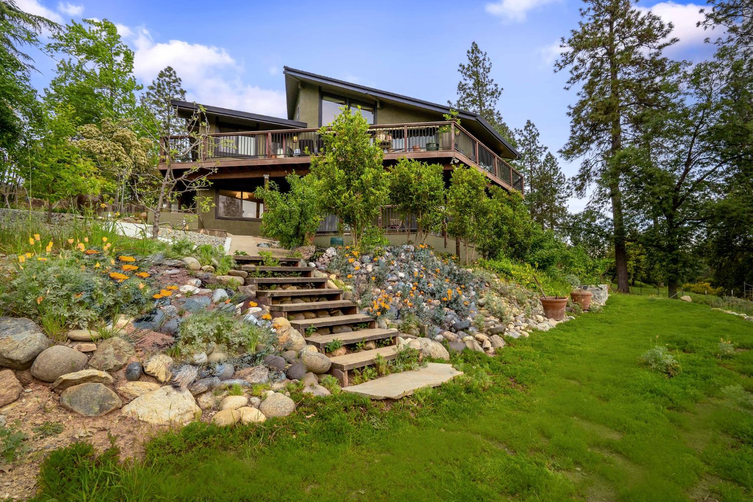 16105 John Way Grass Valley, CA 95949 - Photo 57 of 71 a front view of a house with a yard