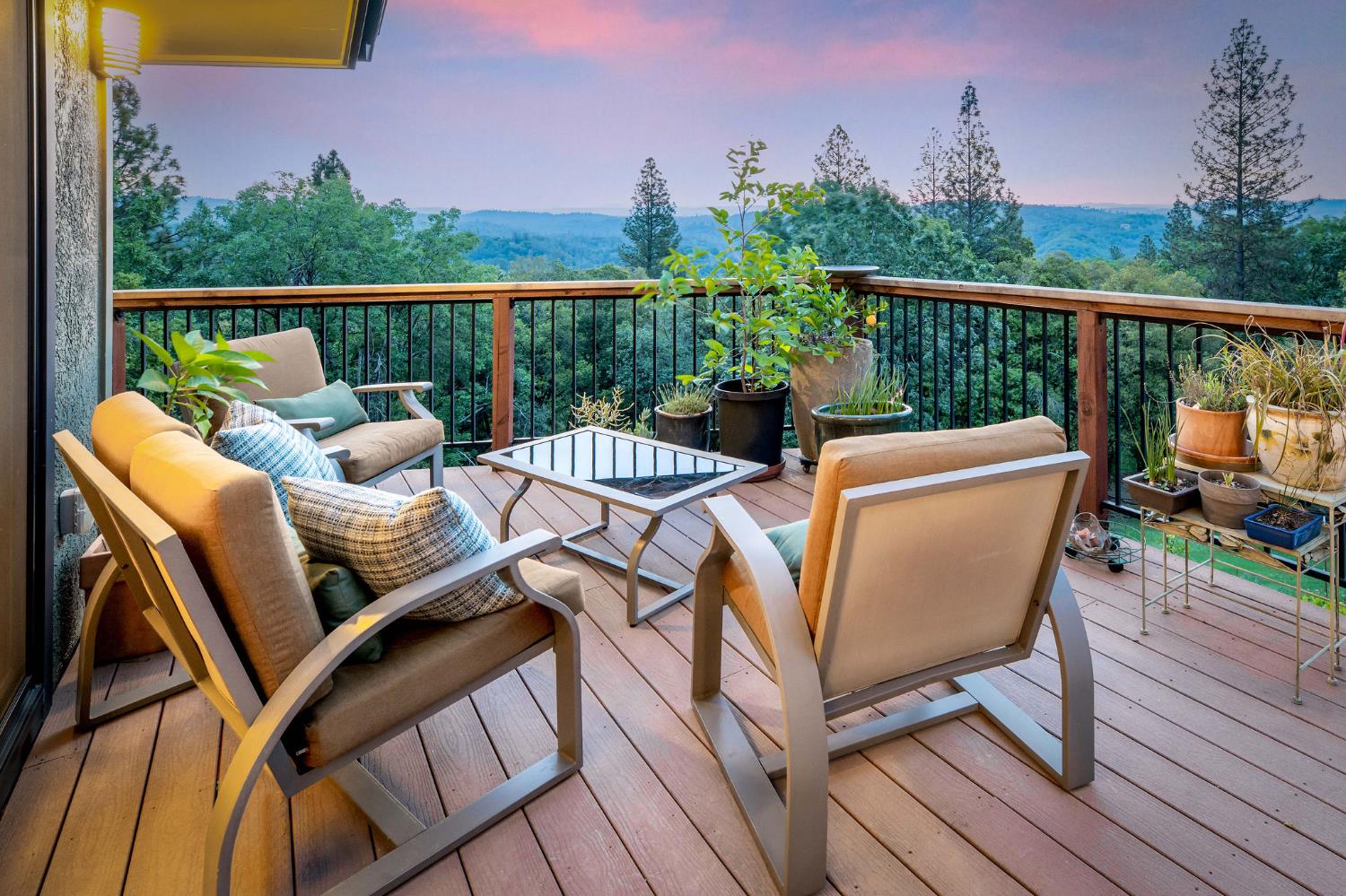16105 John Way Grass Valley, CA 95949 - Photo 6 of 71 a view of a balcony with two chairs and a wooden floor