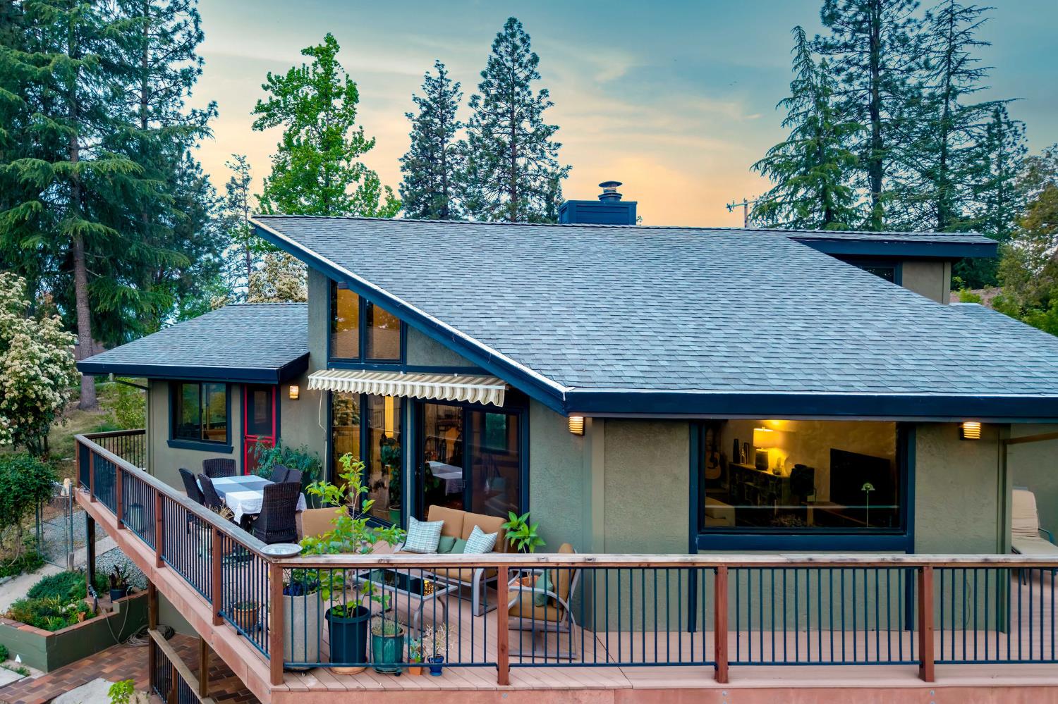 16105 John Way Grass Valley, CA 95949 - Photo 8 of 71 a view of a house with wooden deck and furniture