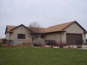 17925 Frazier Road Plano, IL 60548 - Photo 1 of 1 a front view of house with yard and green space