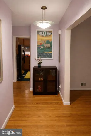 a living room with a fireplace furniture and a window