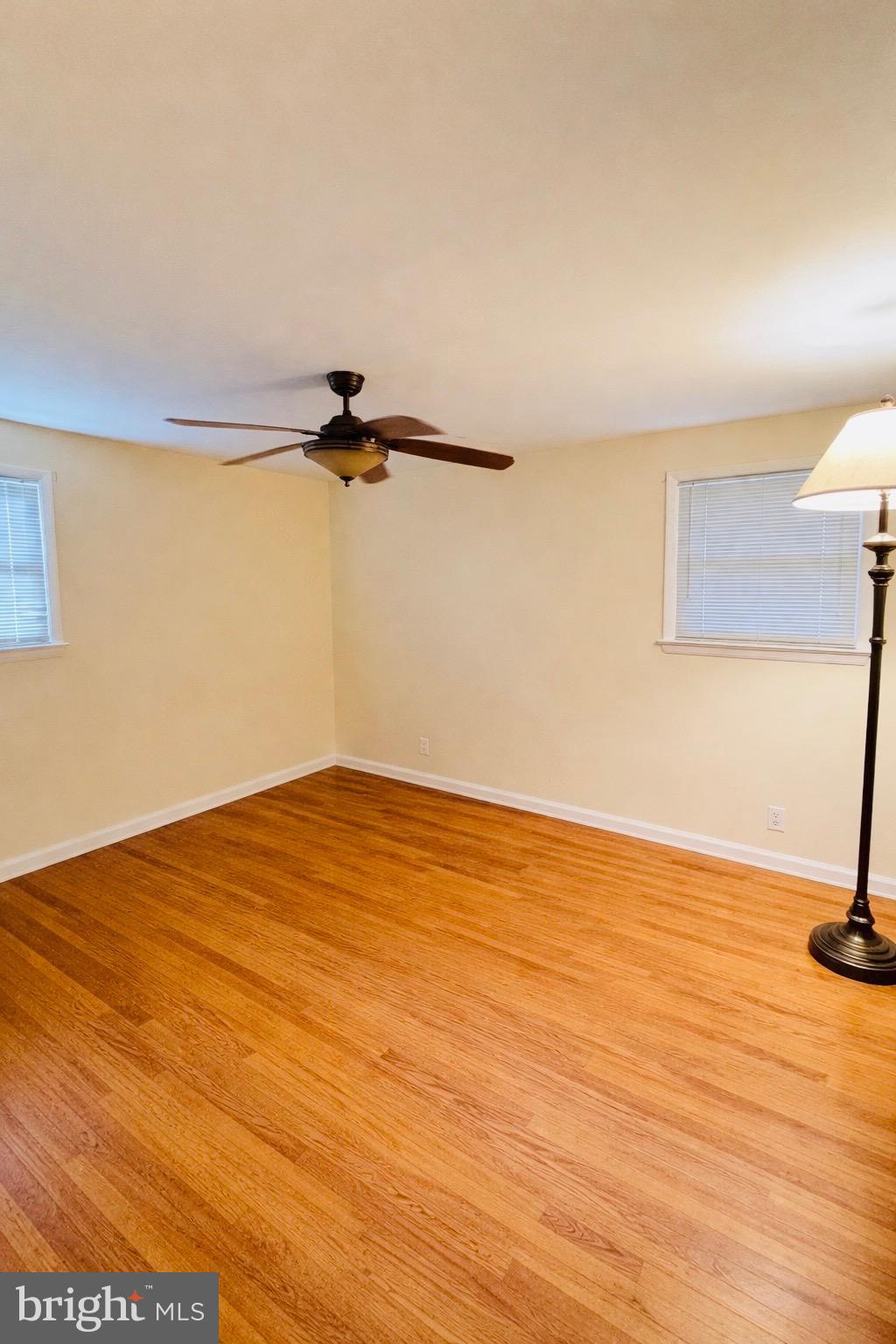 9210 Worth Avenue Silver Spring, MD 20901 - Photo 9 of 20 a view of a room with wooden floor