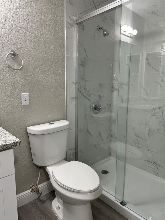 1025 South Hiawassee Road, Unit 2214 Orlando, FL 32835 - Photo 13 of 26 a bathroom with a toilet and a shower