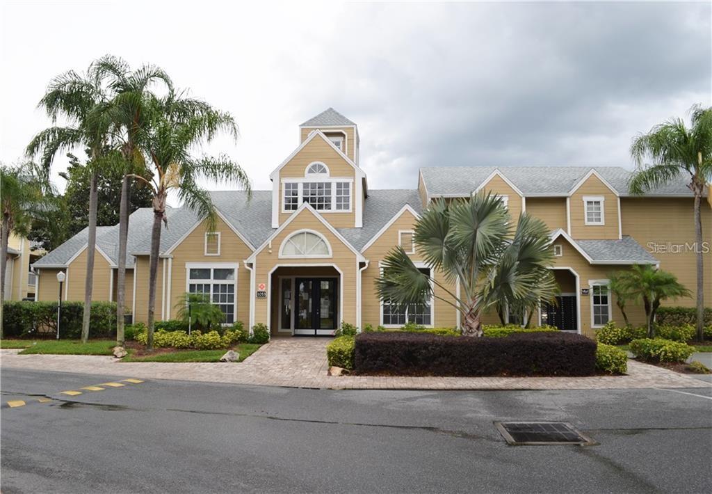 1025 South Hiawassee Road, Unit 2214 Orlando, FL 32835 - Photo 18 of 26 a front view of a house with a garden