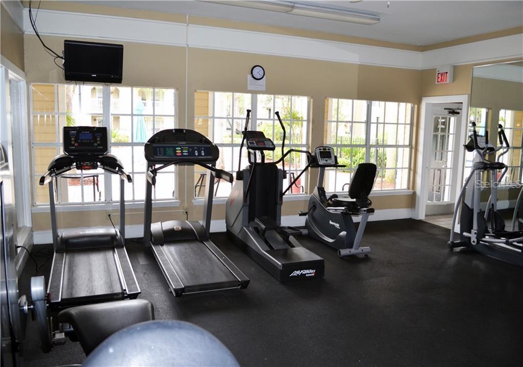 1025 South Hiawassee Road, Unit 2214 Orlando, FL 32835 - Photo 21 of 26 a view of a room with gym equipment