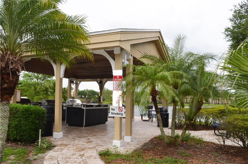 1025 South Hiawassee Road, Unit 2214 Orlando, FL 32835 - Photo 23 of 26 a front view of a house with a porch