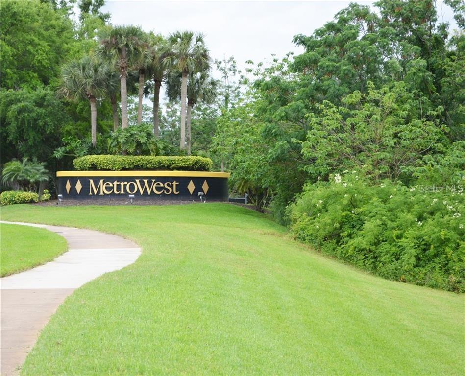 1025 South Hiawassee Road, Unit 2214 Orlando, FL 32835 - Photo 25 of 26 a view of a park with large trees
