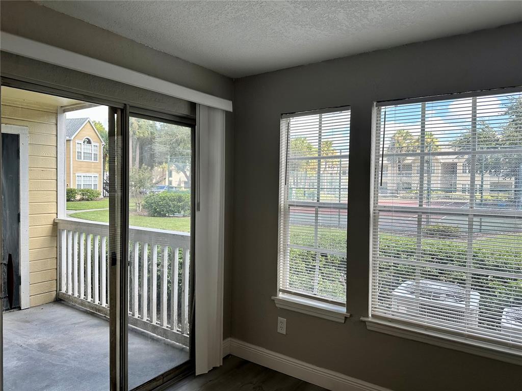 1025 South Hiawassee Road, Unit 2214 Orlando, FL 32835 - Photo 9 of 26 a view of a room that has a large window