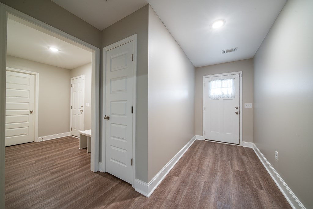 16 Maxwell Drive Fort Mitchell, AL 36856 - Photo 12 of 25 wooden floor in an empty room with wooden floor