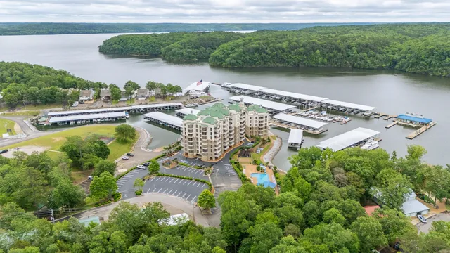 an aerial view of a house with a floor to ceiling window