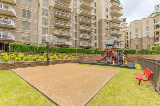 a bathroom with a glass door shower