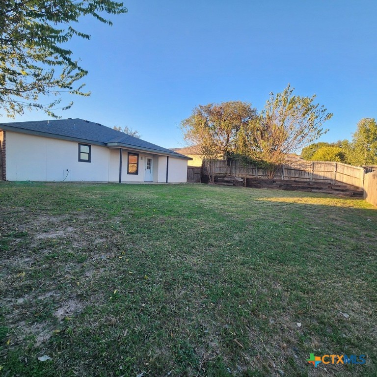 1111 Travis Circle Copperas Cove, TX 76522 - Photo 24 of 24 a view of a big yard next to a house