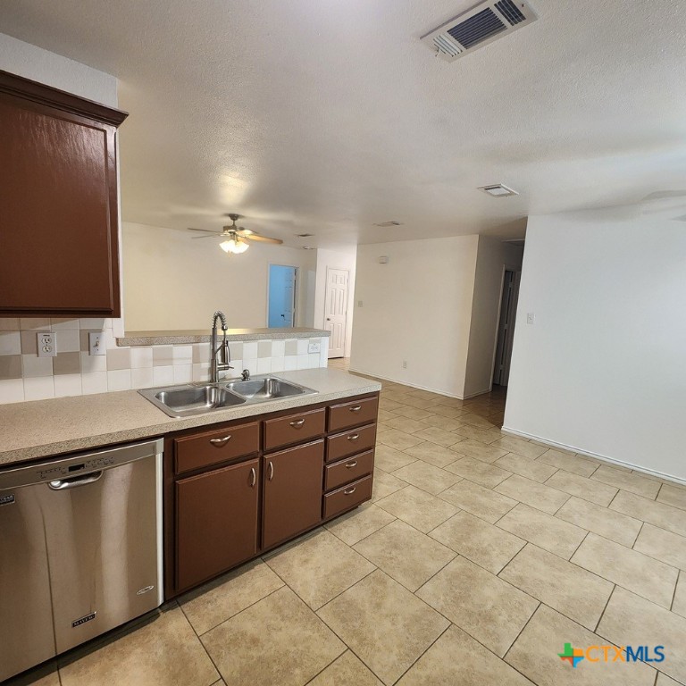 1111 Travis Circle Copperas Cove, TX 76522 - Photo 8 of 24 a large bathroom with a sink and a mirror