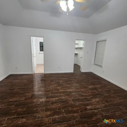 a view of walk in closet with window