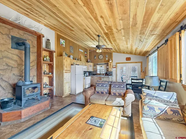 a view of living room filled with furniture