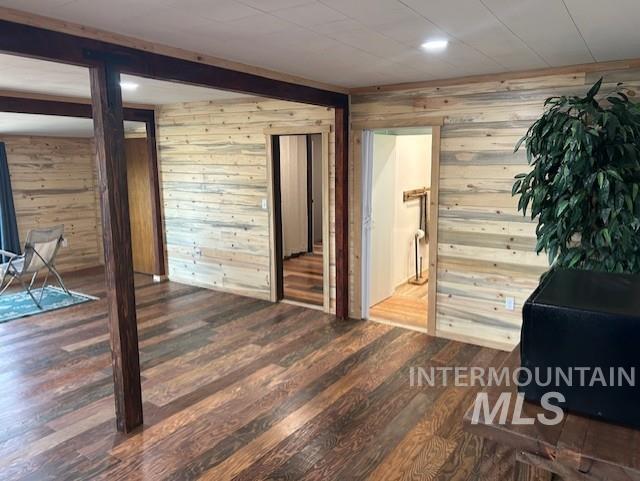 820 Sweeney Road Elk City, ID 83525 - Photo 12 of 45 Interior space featuring wood finished floors, beamed ceiling, wooden walls, and recessed lighting