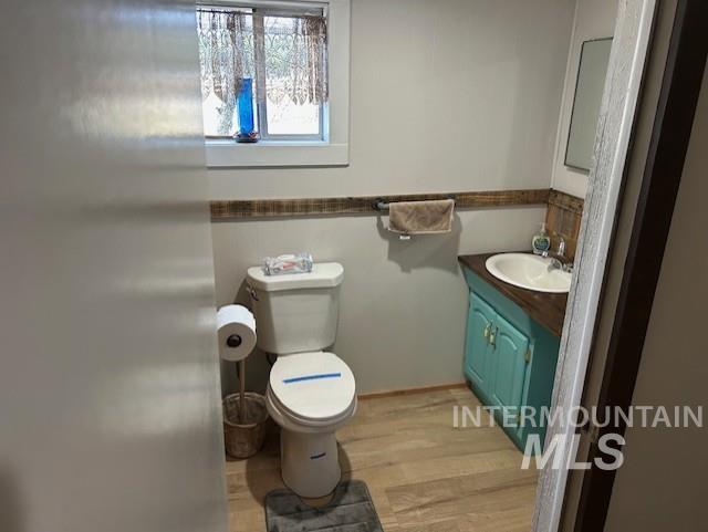 820 Sweeney Road Elk City, ID 83525 - Photo 16 of 45 Bathroom featuring vanity and light wood-style flooring