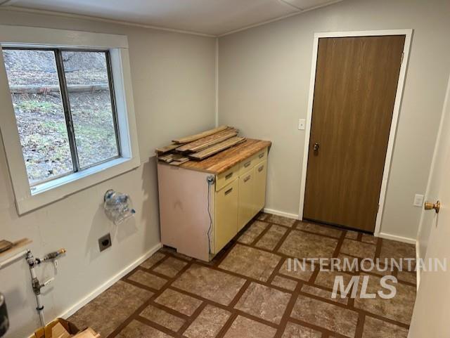 820 Sweeney Road Elk City, ID 83525 - Photo 20 of 45 Laundry area with baseboards