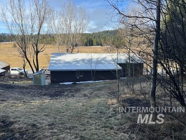 820 Sweeney Road Elk City, ID 83525 - Photo 32 of 45 View of outdoor structure with a view of countryside
