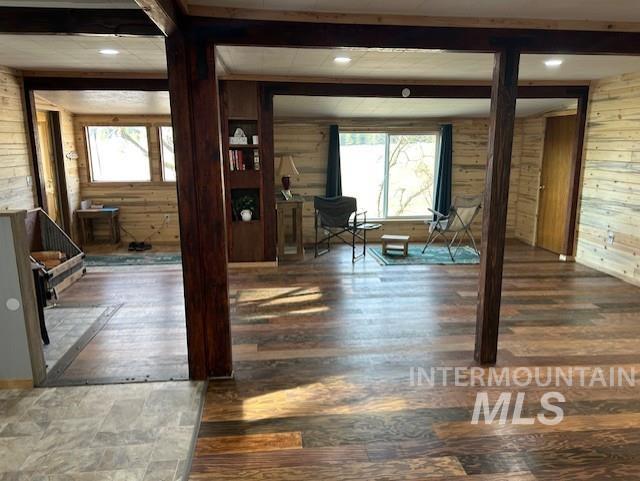 820 Sweeney Road Elk City, ID 83525 - Photo 9 of 45 Entrance foyer featuring wooden walls, beam ceiling, recessed lighting, and wood finished floors