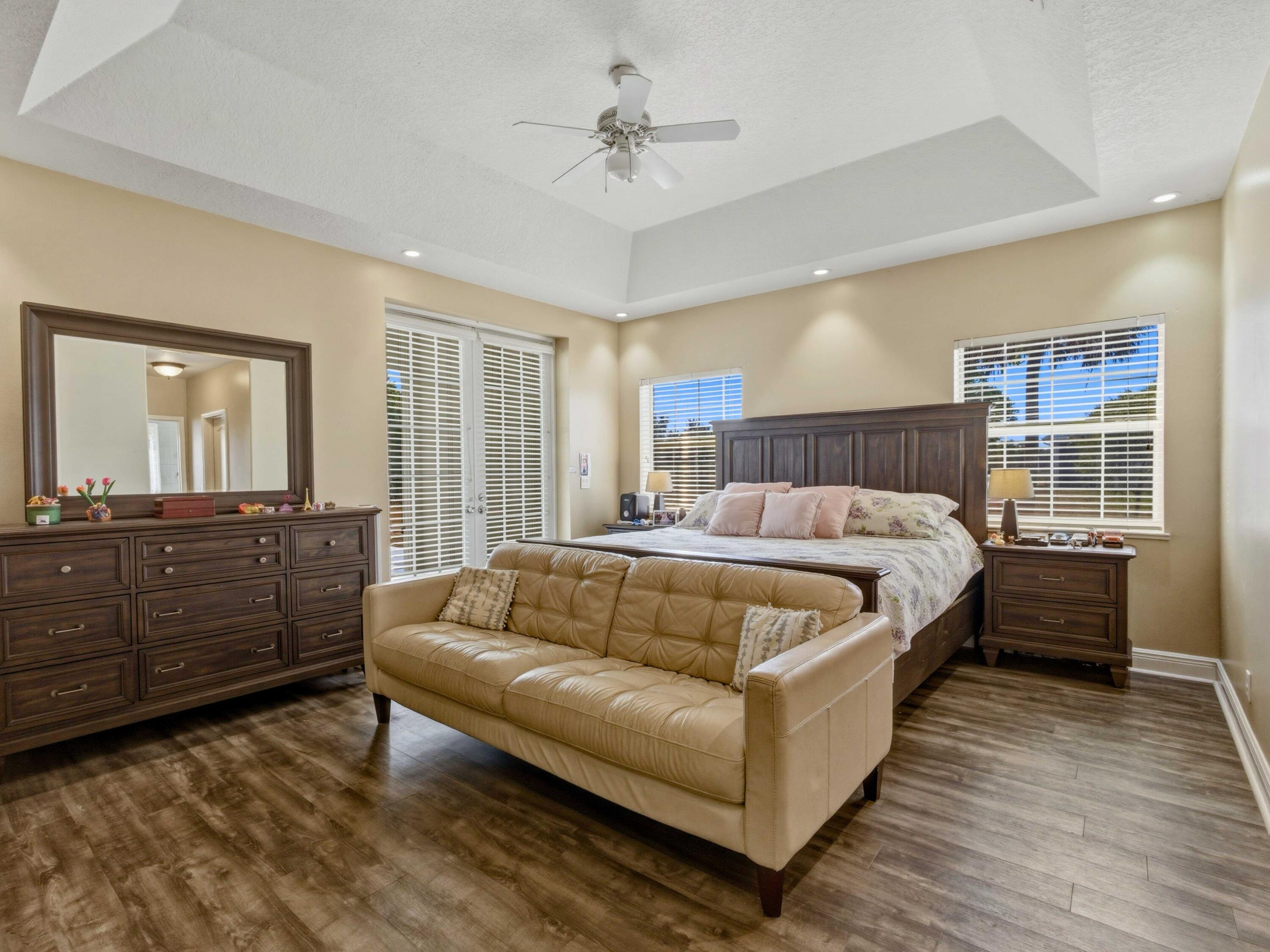 18852 43rd Road North The Acreage, FL 33470 - Photo 9 of 24 a bed room with a bed and a dresser