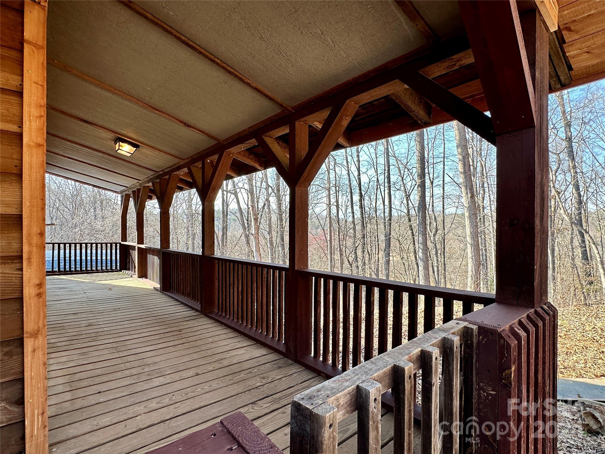 4453 Scott Road Morganton, NC 28655 - Photo 13 of 44 a view of porch with wooden floor