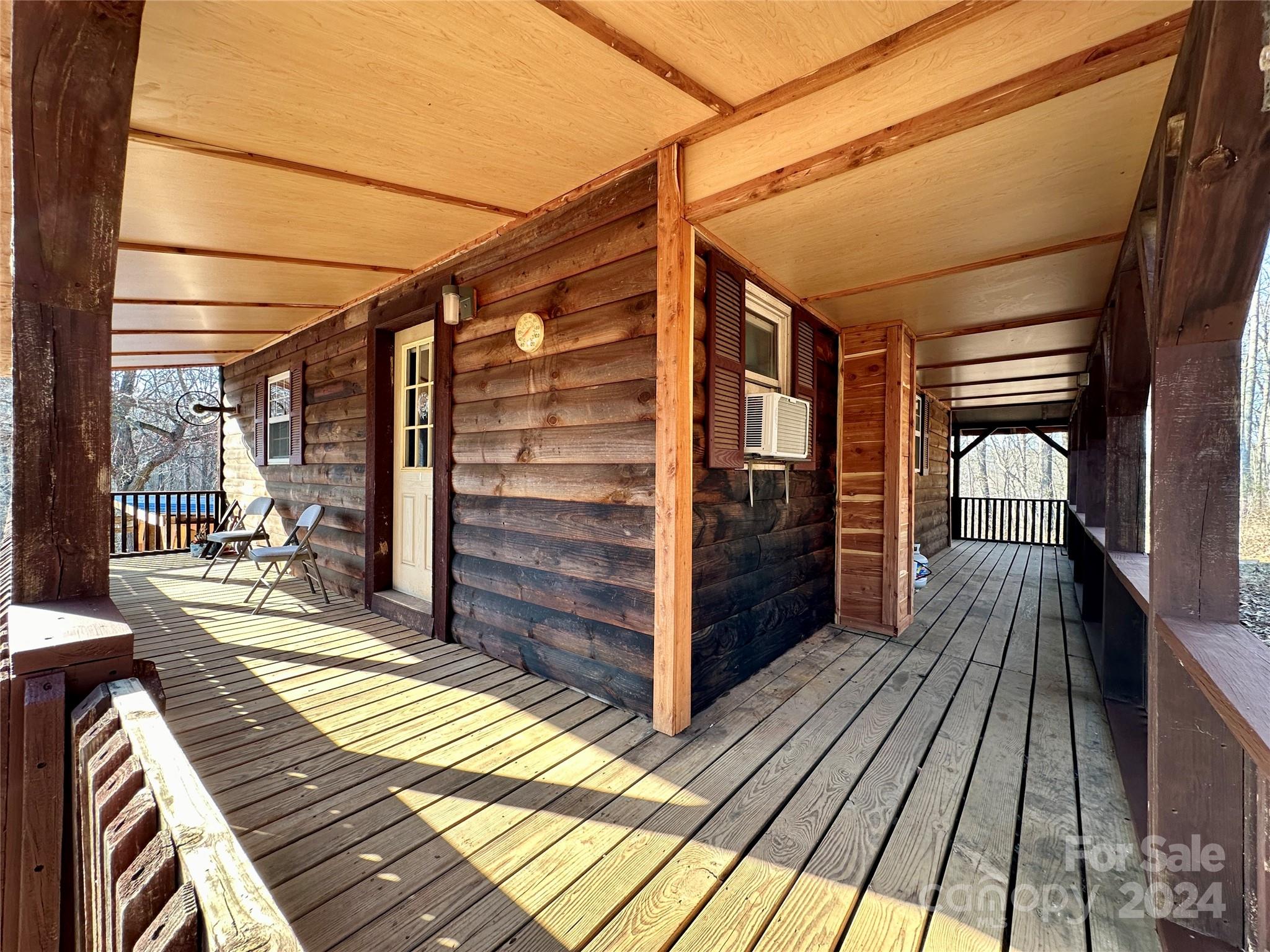 4453 Scott Road Morganton, NC 28655 - Photo 15 of 44 a view of balcony with wooden floor