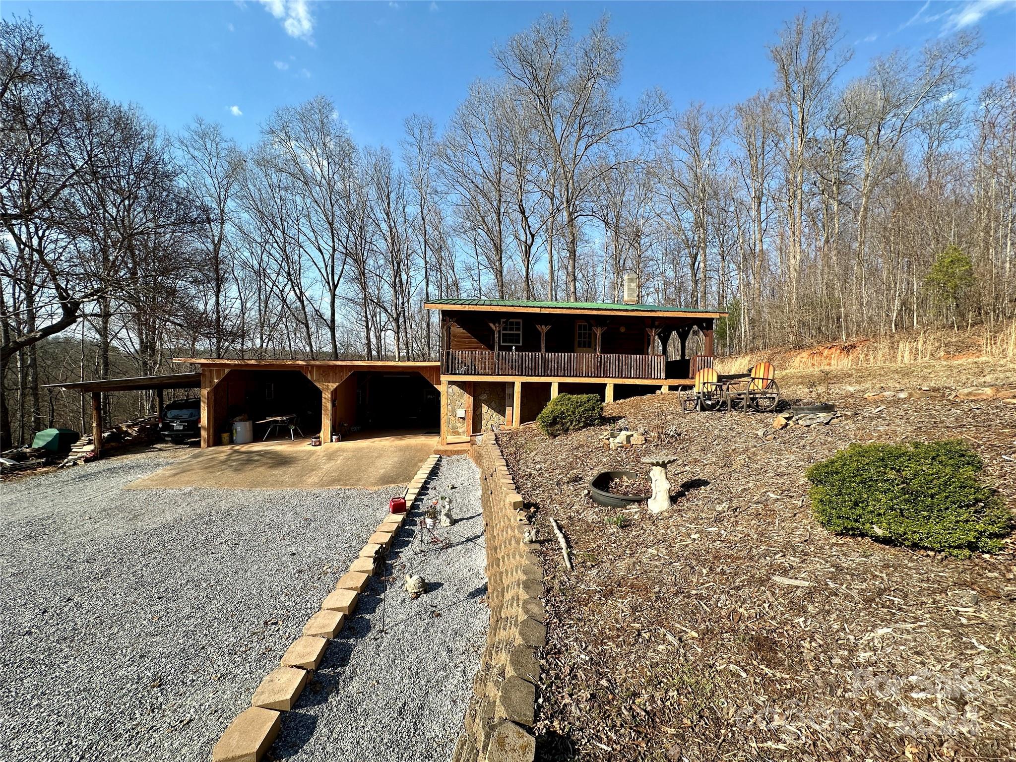 4453 Scott Road Morganton, NC 28655 - Photo 2 of 44 a front view of a house with a yard