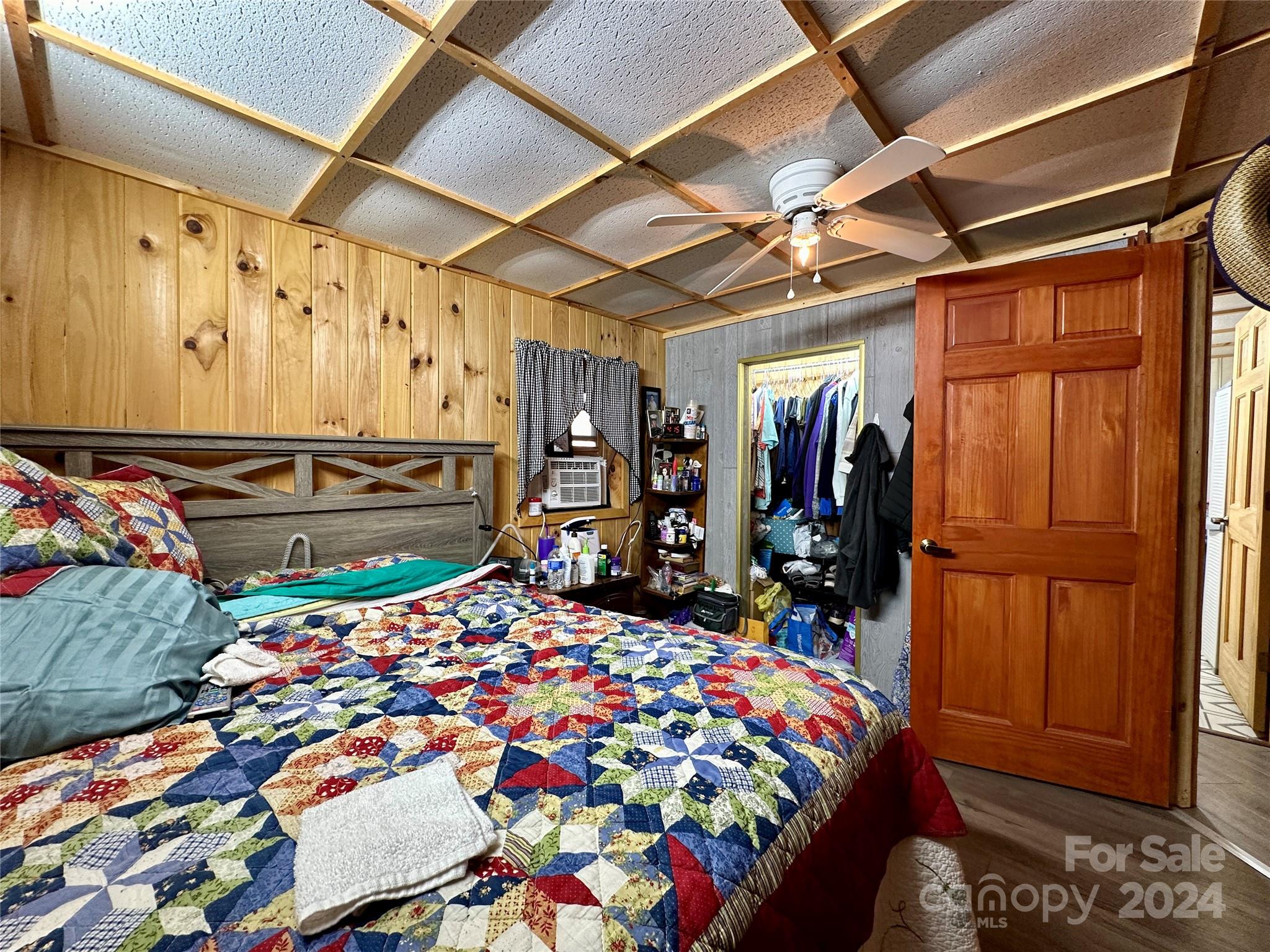 4453 Scott Road Morganton, NC 28655 - Photo 28 of 44 a bed room with a bed and a table